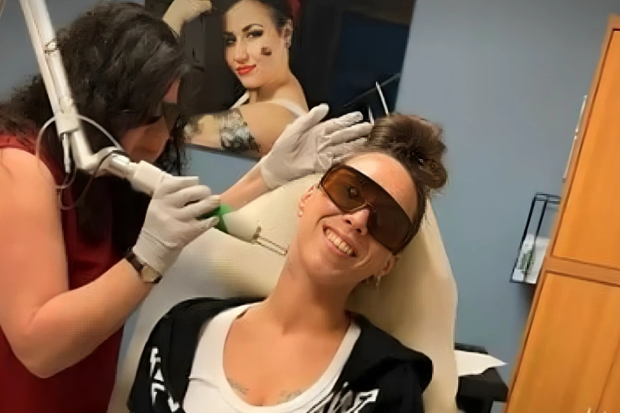 receiving a cosmetic treatment at Lotus Laser Aesthetics clinic.